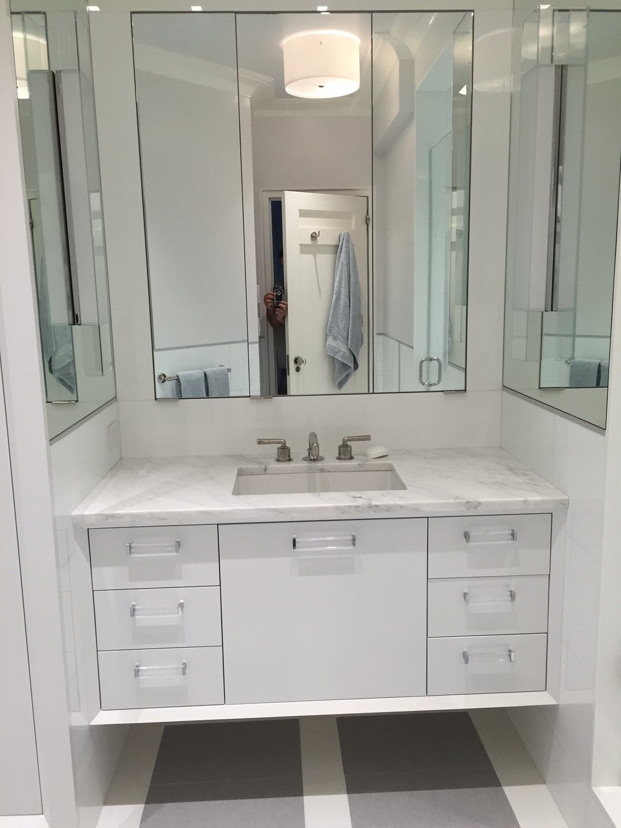 Modern white bathroom vanity with mirror